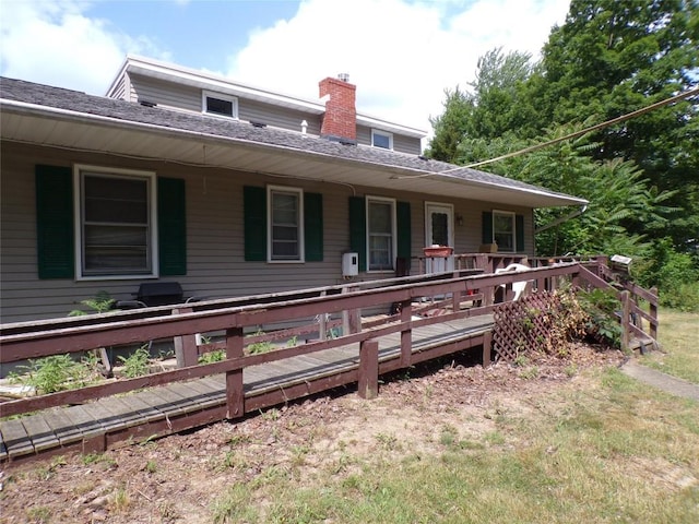 11898 Neiger Rd, Girard, PA 16417 - farmhouse-style home with a chimney, a shingled roof, and covered porch