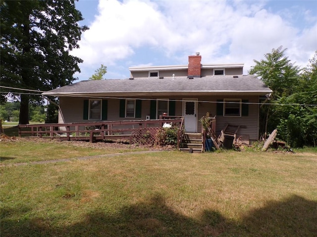 11898 Neiger Rd, Girard, PA 16417 - rear view of house featuring a chimney, a porch, a yard, and a shingled roof
