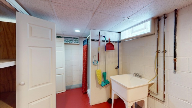 8410 Windsor Beach Ct, Erie, PA 16511 - full bath with concrete block wall, a drop ceiling, and curtained shower
