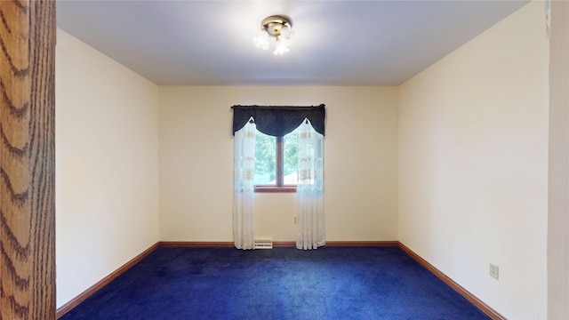 8410 Windsor Beach Ct, Erie, PA 16511 - spare room with dark carpet and baseboards