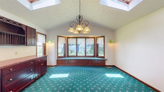 8410 Windsor Beach Ct, Erie, PA 16511 - unfurnished dining area featuring a skylight, carpet floors, a chandelier, and vaulted ceiling