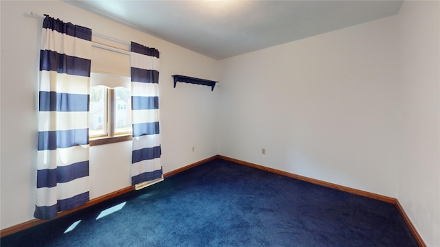 8410 Windsor Beach Ct, Erie, PA 16511 - empty room with dark carpet and baseboards
