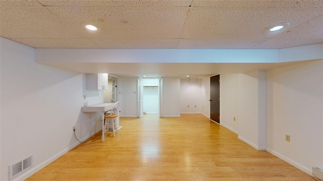 8410 Windsor Beach Ct, Erie, PA 16511 - finished below grade area featuring baseboard heating, light wood-type flooring, and recessed lighting