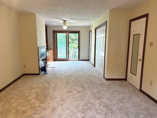 8410 Windsor Beach Ct, Erie, PA 16511 - unfurnished living room featuring light colored carpet and a ceiling fan