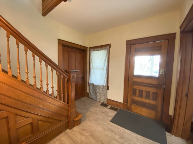 foyer with light hardwood / wood-style flooring