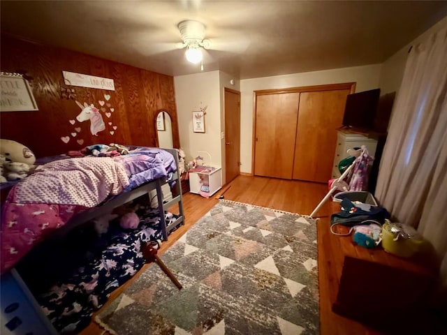 6571 W Lake Rd, Fairview, PA 16415 - bedroom with a closet, light wood-style flooring, and a ceiling fan