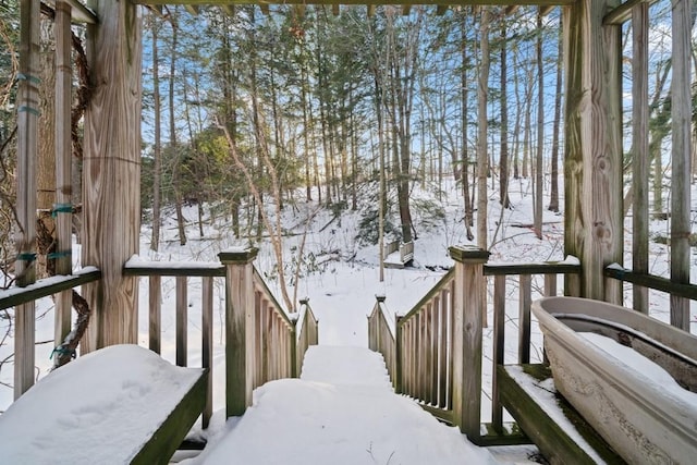 view of snow covered deck