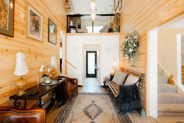 40 Cemetery Rd, Spring Creek, PA 16436 - entryway with stairs, wooden walls, wood finished floors, and a high ceiling