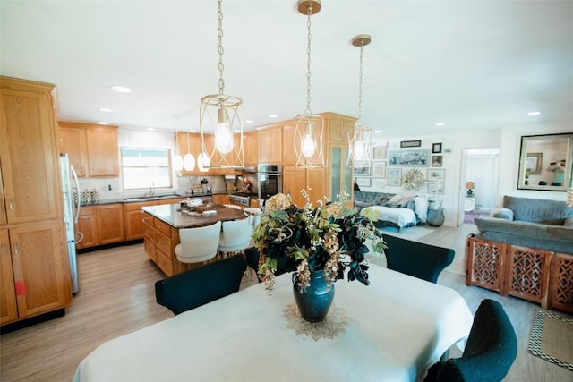40 Cemetery Rd, Spring Creek, PA 16436 - dining space with light wood finished floors and recessed lighting