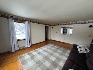 unfurnished living room with light hardwood / wood-style floors