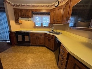 kitchen featuring oven, sink, and dishwasher