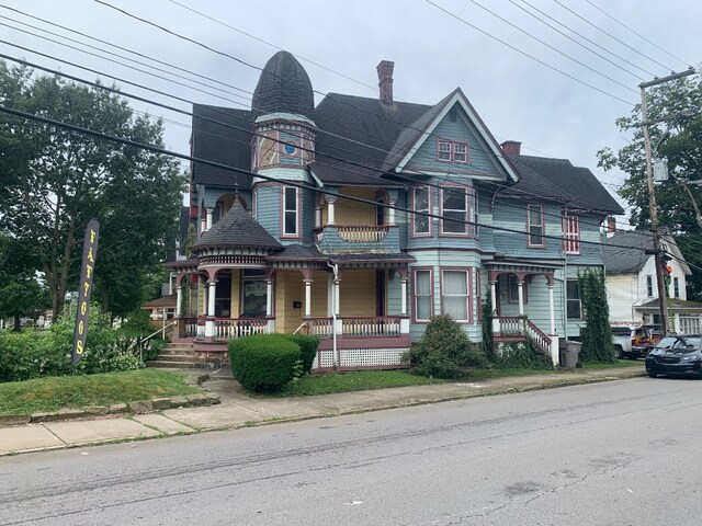 760-762 Park Ave, Meadville, PA 16335 - victorian home with a chimney and a porch