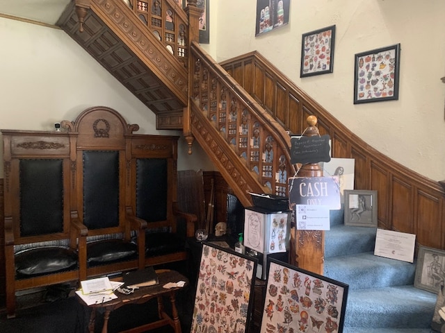 760-762 Park Ave, Meadville, PA 16335 - stairway with a wainscoted wall and carpet floors