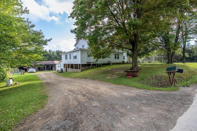 view of front facade with a front yard