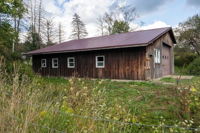 view of outdoor structure featuring a garage