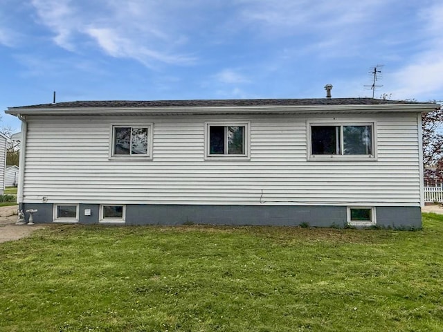 view of property exterior featuring a yard