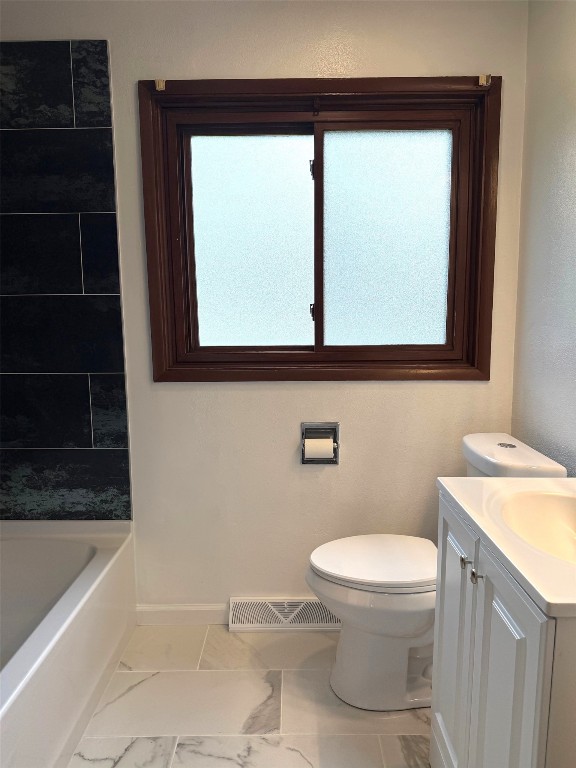 full bathroom featuring a healthy amount of sunlight, baseboards, marble finish floor, and visible vents