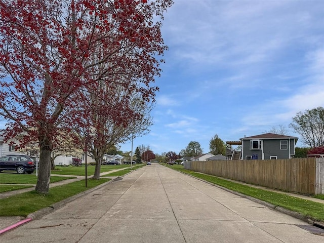 view of road featuring sidewalks and curbs