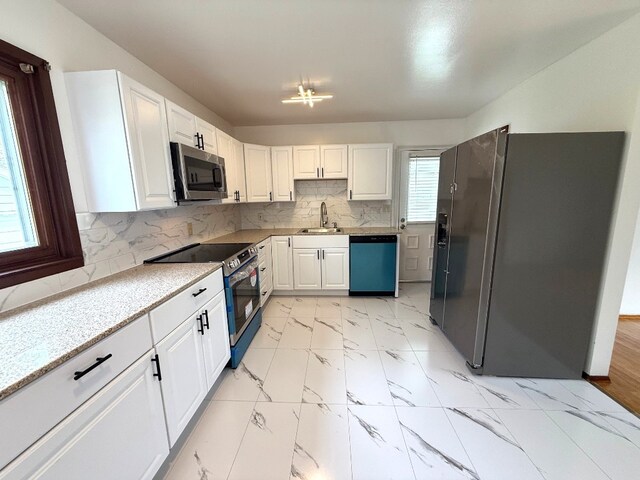 kitchen featuring electric range oven, stainless steel microwave, white cabinets, fridge with ice dispenser, and dishwasher