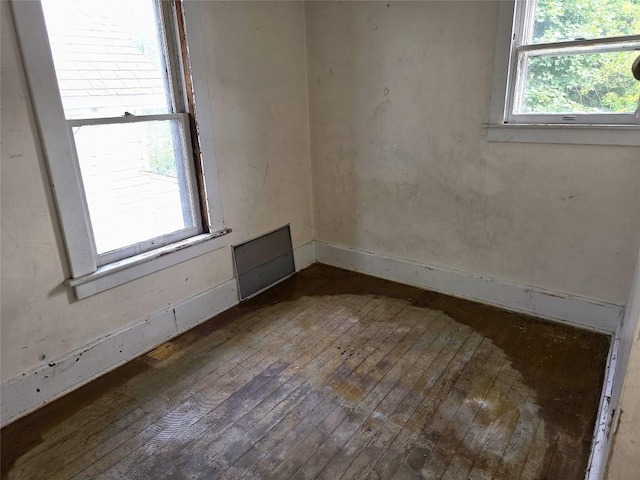 1051-1053 W 9th St, Erie, PA 16502 - empty room featuring hardwood / wood-style flooring and baseboards