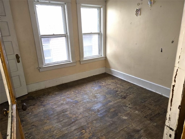 1051-1053 W 9th St, Erie, PA 16502 - empty room with baseboards and dark wood finished floors