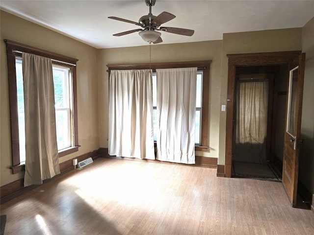 1051-1053 W 9th St, Erie, PA 16502 - unfurnished room featuring wood finished floors and a ceiling fan
