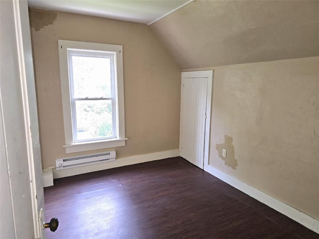 1051-1053 W 9th St, Erie, PA 16502 - additional living space with a baseboard radiator, dark wood finished floors, and lofted ceiling
