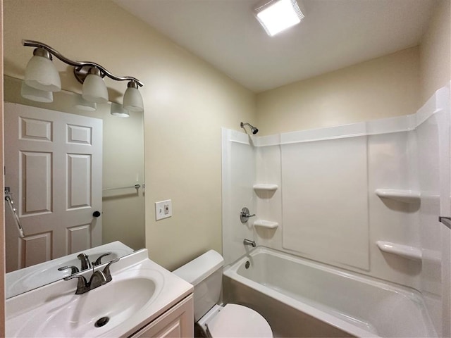 full bath featuring toilet,  shower combination, and vanity