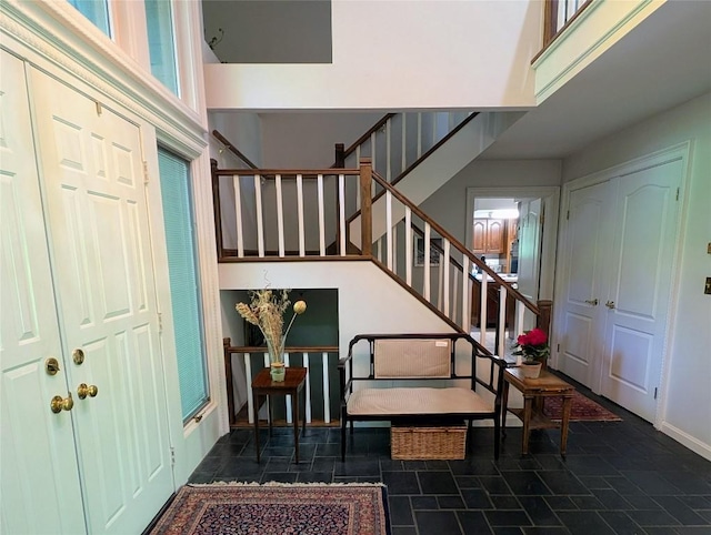5441 Thomas Rd, Fairview, PA 16415 - foyer with stairway, a high ceiling, and baseboards