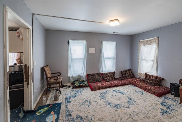 946 W 17th St, Erie, PA 16502 - carpeted living room featuring healthy amount of natural light