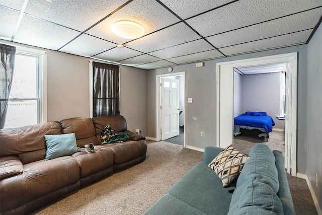 946 W 17th St, Erie, PA 16502 - carpeted living room featuring a drop ceiling and baseboards