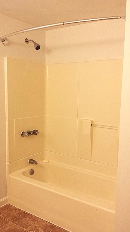 362 Randolph St, Meadville, PA 16335 - bathroom featuring washtub / shower combination and tile patterned flooring