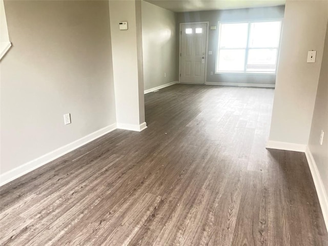 2517 Mccain Ave, Erie, PA 16510 - spare room featuring dark wood-type flooring and baseboards
