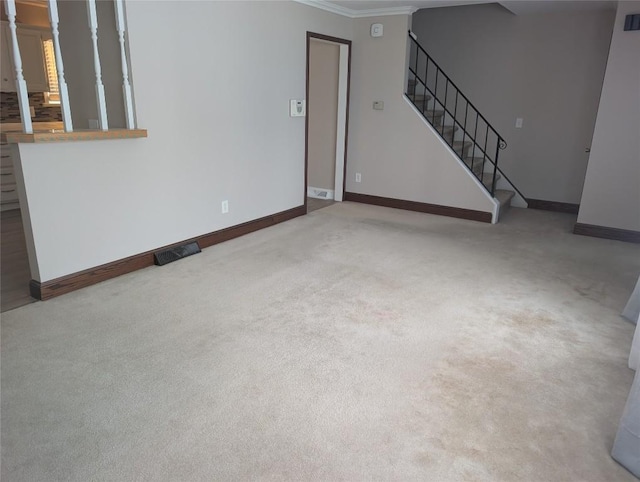 unfurnished living room with baseboards, stairs, visible vents, and carpet flooring