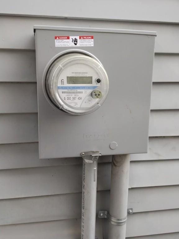 exterior details featuring electric meter