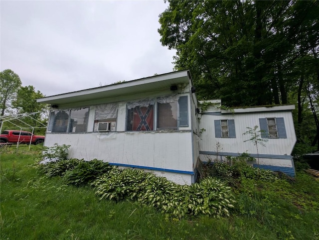 12838 Reed Ave, Conneaut Lake, PA 16316 - view of home's exterior with cooling unit
