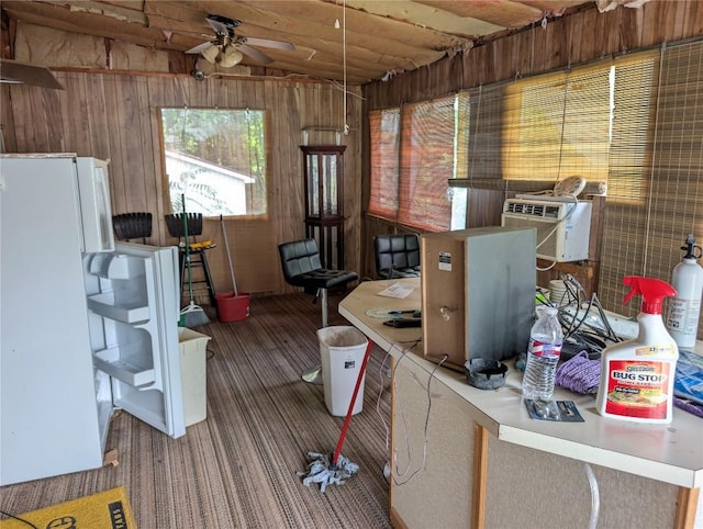12838 Reed Ave, Conneaut Lake, PA 16316 - miscellaneous room featuring wood walls, carpet, and a ceiling fan