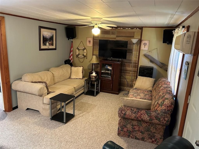 carpeted living room featuring ceiling fan and crown molding