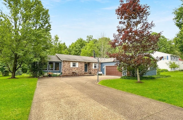 5751 W Ave, Edinboro, PA 16412 - ranch-style home featuring driveway, an attached garage, a front yard, and brick siding