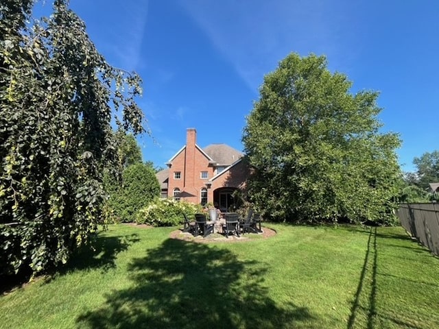 view of yard with a patio area and fence