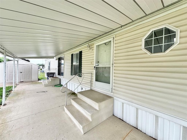 10644 W Main Rd Unit 45, North East, PA 16428 - view of patio / terrace featuring a shed