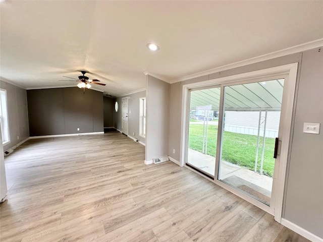 10644 W Main Rd Unit 45, North East, PA 16428 - empty room featuring ornamental molding, a ceiling fan, and light wood finished floors