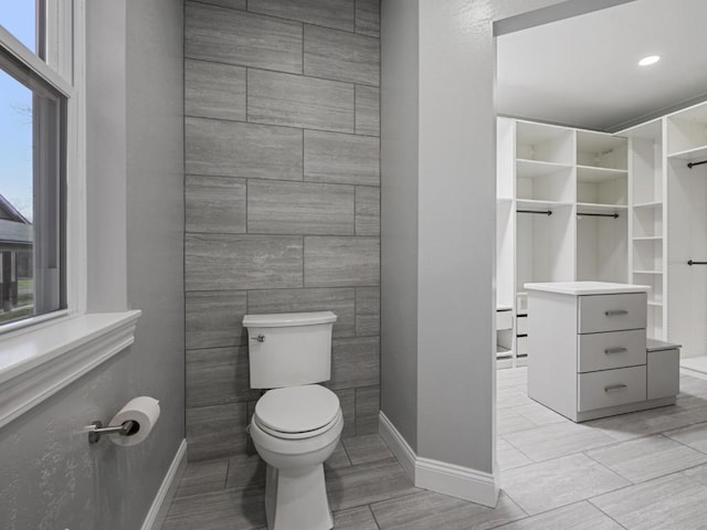 11350 State Highway 618, Conneaut Lake, PA 16316 - bathroom featuring toilet, baseboards, and a spacious closet