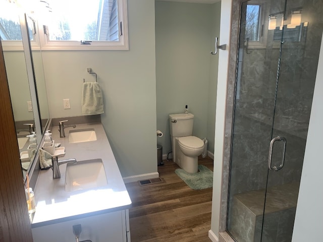 11148 Aldina Dr, Conneaut Lake, PA 16316 - full bath with visible vents, a shower stall, toilet, and a sink