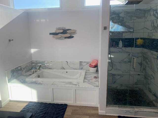 11148 Aldina Dr, Conneaut Lake, PA 16316 - full bath featuring wood finished floors, a garden tub, and a stall shower