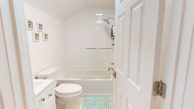 1450 Nicholson St, Erie, PA 16509 - bathroom featuring vanity, tub / shower combination, tile patterned flooring, tile walls, and lofted ceiling