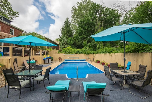 1450 Nicholson St, Erie, PA 16509 - view of swimming pool featuring a fenced backyard, outdoor dining area, and a patio area