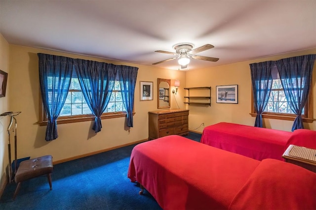 bedroom featuring ceiling fan and carpet floors