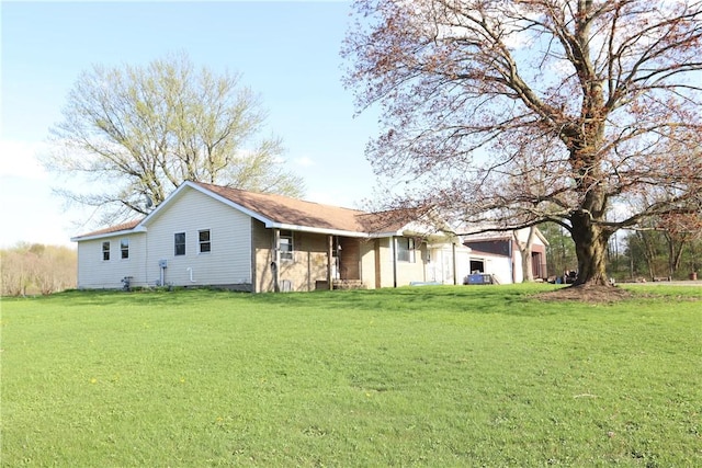 exterior space with a yard