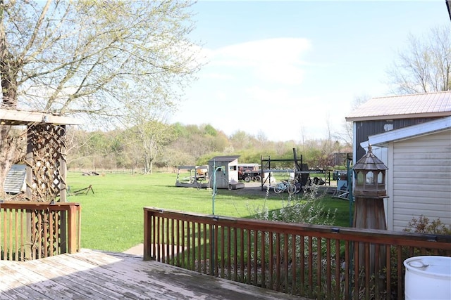 wooden deck with a yard